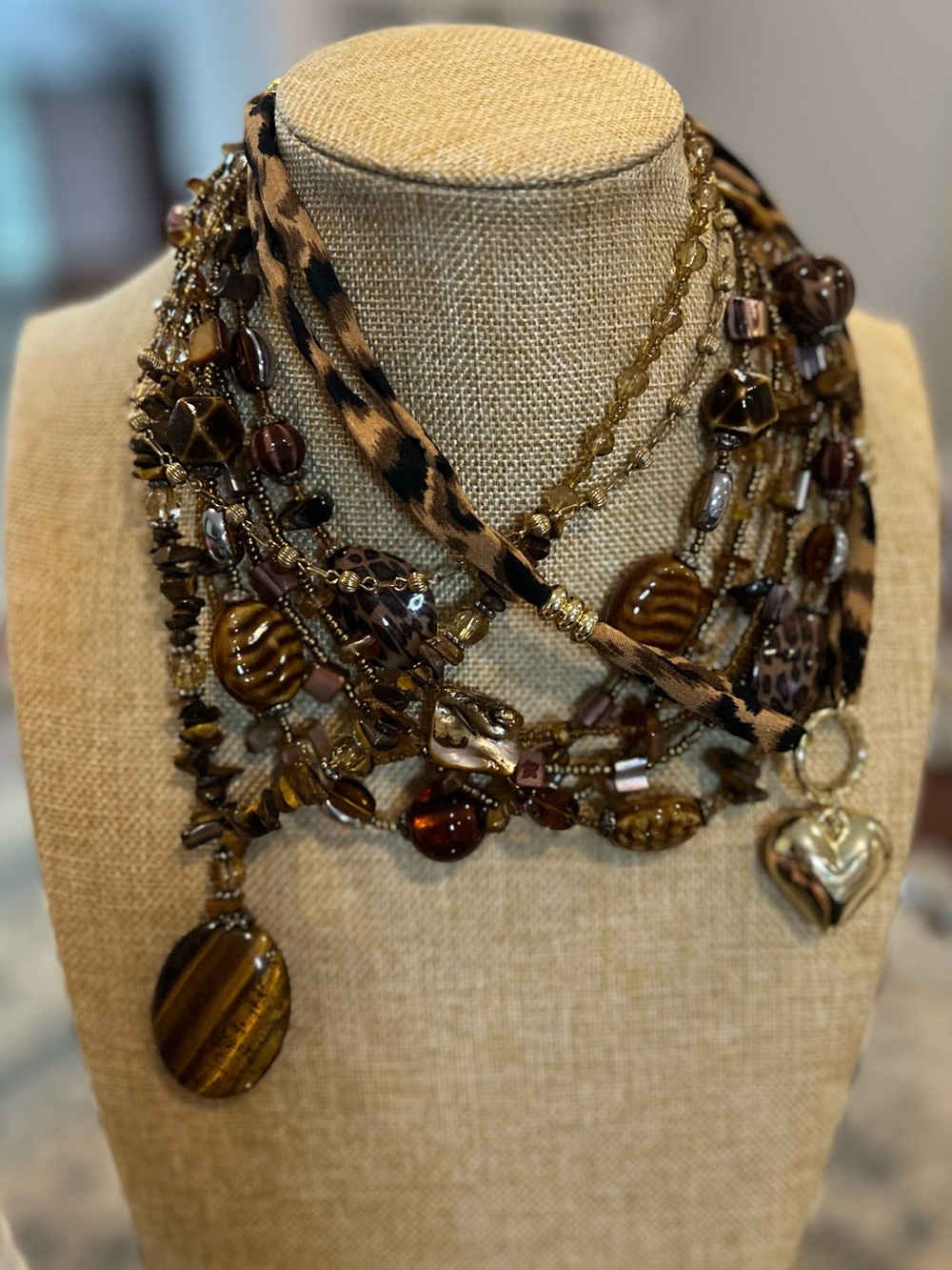 Mix of Brown glass and acrylic  Necklaces with a Monet gold tone necklace